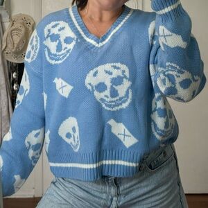 Blue skull sweater size medium
